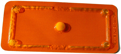 A single pill in blister packaging