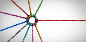 metaphor for partnership: muticolored ropes connected together as a corporate network