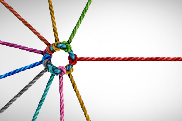 metaphor for partnership: muticolored ropes connected together as a corporate network