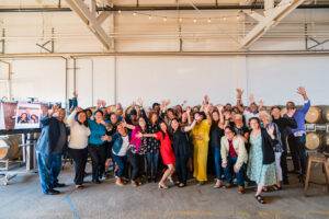 Group photo of CAPTC staff waving.
